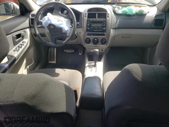 ✅ 2006 Kia Spectra • VIN: KNAFE161765345598 • Lot: 57976585. Wystawiony na Copart z przebiegiem 176 804 mil. Bezpłatny archiwum sprzedaży aukcyjnych z USA i szczegółowy raport historii pojazdu na DreamBid. Zdjęcie 8.