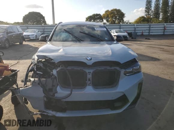 ✅ 2022 BMW X4 M • VIN: 5YM23EC00N9L35827 • Лот: 87932635. Опубликован ранее на Copart с пробегом Не указан. Бесплатный доступ к архиву аукционных продаж из США и подробный отчёт об истории автомобиля на DreamBid. Изображение 5.