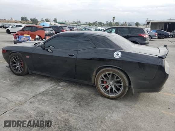 2016 Dodge Challenger SRT 392 с VIN 2C3CDZDJXGH331929, выставлен на аукционе Copart как лот 81610275 с пробегом 64 882 миль миль и Списание • Salvage title. История ставок и продаж доступна на DreamBid. Изображение 2.