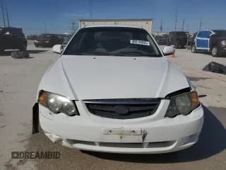 ✅ 2002 Kia Spectra GS • VIN: KNAFB161725077686 • Лот: 48618095. Опубликован ранее на Copart с пробегом 99 702 миль. Бесплатный доступ к архиву аукционных продаж из США и подробный отчёт об истории автомобиля на DreamBid. Изображение 5.