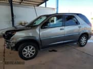 ✅ 2002 Buick Rendezvous CX • VIN: 3G5DA03E52S607407 • Лот: 70388145. Опубликован ранее на Copart с пробегом 135 766 миль. Бесплатный доступ к архиву аукционных продаж из США и подробный отчёт об истории автомобиля на DreamBid. Изображение 1.