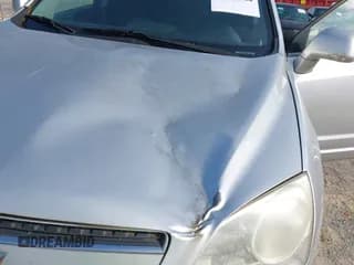 ✅ 2013 Chevrolet Captiva Sport LT • VIN: 3GNAL3EK1DS568948 • Lot: 42501040. Wystawiony na IAAI z przebiegiem 165 721 mil. Bezpłatny archiwum sprzedaży aukcyjnych z USA i szczegółowy raport historii pojazdu na DreamBid. Zdjęcie 6.