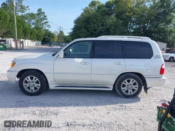 ✅ 2005 Lexus LX 470 • VIN: JTJHT00W754000878 • Lot: 42727042. Wystawiony na IAAI z przebiegiem 263 799 mil. Bezpłatny archiwum sprzedaży aukcyjnych z USA i szczegółowy raport historii pojazdu na DreamBid. Zdjęcie 14.