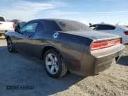 ✅ 2013 Dodge Challenger SXT • VIN: 2C3CDYAG0DH607663 • Lot: 75195794. Wystawiony na Copart z przebiegiem 127 587 mil. Bezpłatny archiwum sprzedaży aukcyjnych z USA i szczegółowy raport historii pojazdu na DreamBid. Zdjęcie 2.