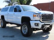 ✅ 2015 GMC Sierra 2500HD Denali • VIN: 1GT120E80FF175769 • Lot: 63915115. Listed on Copart with 116,447 mi. Free auction sales archive from the USA and detailed vehicle history report at DreamBid. Image 1.
