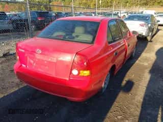 2005 Hyundai Accent GLS с VIN KMHCG45CX5U608980, выставлен на аукционе IAAI как лот 43440401 с пробегом 137 550 миль миль и . История ставок и продаж доступна на DreamBid. Изображение 4.