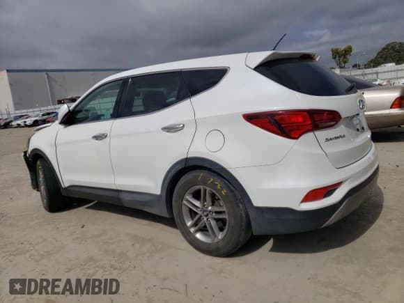 ✅ 2018 Hyundai Santa Fe 2.4L • VIN: 5NMZT3LB0JH069656 • Лот: 49268604. Опубликован ранее на Copart с пробегом 95 553 миль. Бесплатный доступ к архиву аукционных продаж из США и подробный отчёт об истории автомобиля на DreamBid. Изображение 2.