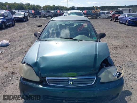 ✅ 2000 Honda Civic LX • VIN: 2HGEJ6674YH511875 • Lot: 43344972. Listed on IAAI with 192,750 mi. Free auction sales archive from the USA and detailed vehicle history report at DreamBid. Image 12.