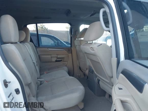 ✅ 2012 Nissan Armada Platinum • VIN: 5N1BA0NC5CN605983 • Lot: 43850123. Listed on IAAI with 142,828 mi. Free auction sales archive from the USA and detailed vehicle history report at DreamBid. Image 8.
