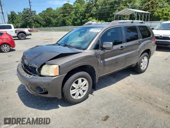 ✅ 2011 Mitsubishi Endeavor LS • VIN: 4A4JM2AS2BE034718 • Лот: 60546475. Опубликован ранее на Copart с пробегом 115 927 миль. Бесплатный доступ к архиву аукционных продаж из США и подробный отчёт об истории автомобиля на DreamBid. Изображение 1.