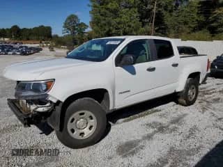 2020 Chevrolet Colorado 2WD Work Truck with VIN 1GCGSBEN7L1180147, listed as a Copart auction lot 90374865 with 142,304 mi miles and Salvage title. Bid and sale history available at DreamBid. Image 1.