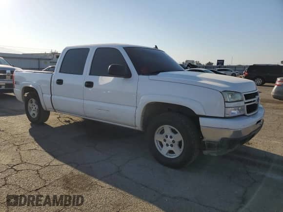 2006 Chevrolet Silverado 1500 LT1 with VIN 2GCEK13Z461295312, listed as a Copart auction lot 71477394 with 163,832 mi miles and Salvage title. Bid and sale history available at DreamBid. Image 4.
