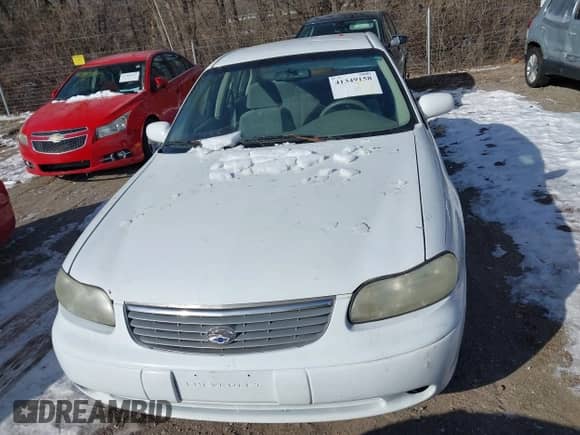 1999 Chevrolet Malibu z VIN 1G1ND52M2XY166192, wystawiony jako IAAI lot #41349158 z przebiegiem 136 003 mil mil oraz . Historia ofert i sprzedaży dostępna na DreamBid. Obrazek 6.