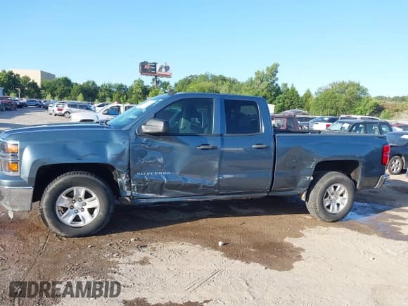 ✅ 2014 Chevrolet Silverado 1500 LT • VIN: 1GCRCREHXEZ214448 • Lot: 42853270. Listed on IAAI with 143,726 mi. Free auction sales archive from the USA and detailed vehicle history report at DreamBid. Image 15.