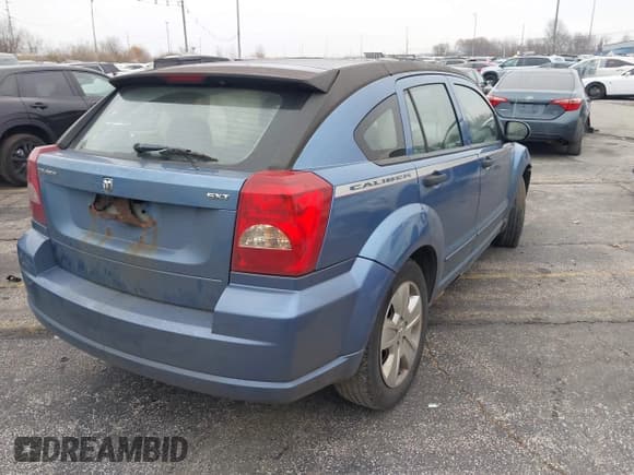 ✅ 2007 Dodge Caliber SXT • VIN: 1B3HB48B47D187063 • Lot: 43754083. Listed on IAAI with 198,763 mi. Free auction sales archive from the USA and detailed vehicle history report at DreamBid. Image 4.