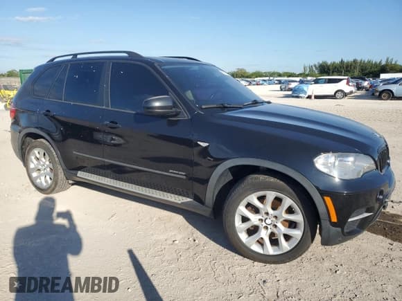 ✅ 2012 BMW X5 35i • VIN: 5UXZV4C53CL758827 • Lot: 93071435. Listed on Copart with Not provided. Free auction sales archive from the USA and detailed vehicle history report at DreamBid. Image 4.