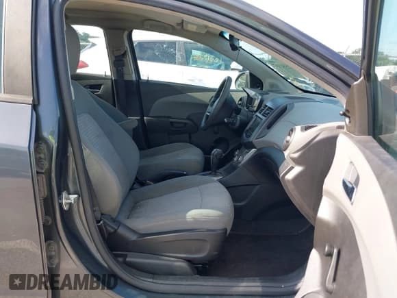 ✅ 2013 Chevrolet Sonic LS • VIN: 1G1JA6SH0D4212041 • Lot: 42552147. Listed on IAAI with 192,934 mi. Free auction sales archive from the USA and detailed vehicle history report at DreamBid. Image 5.