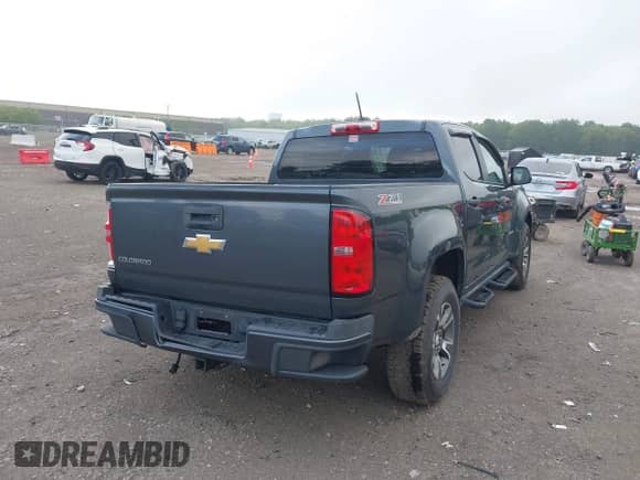 2015 Chevrolet Colorado 4WD Z71 z VIN 1GCGTCE31F1246360, wystawiony jako IAAI lot #42857888 z przebiegiem 125 198 mil mil oraz . Historia ofert i sprzedaży dostępna na DreamBid. Obrazek 4.