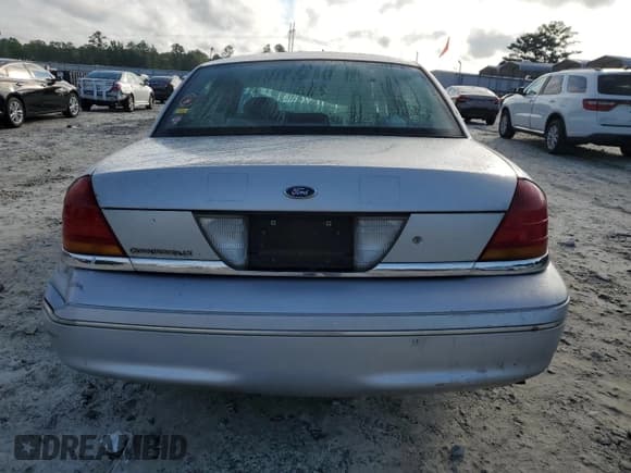 ✅ 2001 Ford Crown Victoria LX • VIN: 2FAFP74W81X106606 • Lot: 67630815. Listed on Copart with Not provided. Free auction sales archive from the USA and detailed vehicle history report at DreamBid. Image 6.
