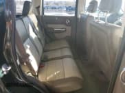 ✅ 2010 Dodge Nitro SXT • VIN: 1D4PU5GK7AW148137 • Lot: 46541785. Listed on Copart with 130,013 mi. Free auction sales archive from the USA and detailed vehicle history report at DreamBid. Image 11.