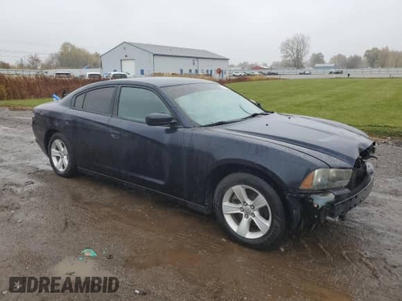 ✅ 2012 Dodge Charger SE • VIN: 2C3CDXBG3CH190126 • Lot: 90360825. Listed on Copart with 180,005 mi. Free auction sales archive from the USA and detailed vehicle history report at DreamBid. Image 4.