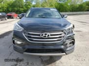 ✅ 2017 Hyundai Santa Fe 2.4L • VIN: 5XYZUDLB1HG412675 • Lot: 57169045. Wystawiony na Copart z przebiegiem 38 947 mil. Bezpłatny archiwum sprzedaży aukcyjnych z USA i szczegółowy raport historii pojazdu na DreamBid. Zdjęcie 5.