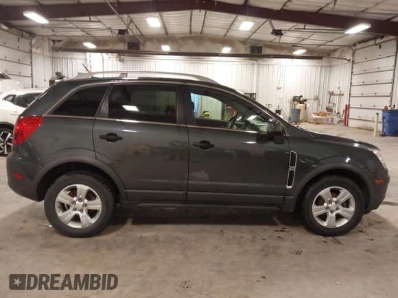 ✅ 2013 Chevrolet Captiva Sport LS • VIN: 3GNFL2EK7DS516739 • Lot: 42216391. Wystawiony na IAAI z przebiegiem 69 638 mil. Bezpłatny archiwum sprzedaży aukcyjnych z USA i szczegółowy raport historii pojazdu na DreamBid. Zdjęcie 13.