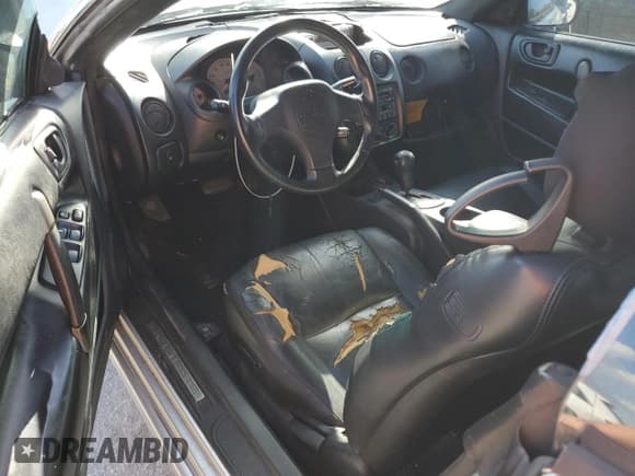 ✅ 2001 Mitsubishi Eclipse GT • VIN: 4A3AE85H41E133199 • Lot: 76689964. Wystawiony na Copart z przebiegiem Nie podano. Bezpłatny archiwum sprzedaży aukcyjnych z USA i szczegółowy raport historii pojazdu na DreamBid. Zdjęcie 8.