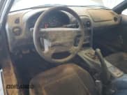 ✅ 1997 Mazda MX-5 Miata • VIN: JM1NA3536V0723334 • Lot: 79363324. Wystawiony na Copart z przebiegiem 94 099 mil. Bezpłatny archiwum sprzedaży aukcyjnych z USA i szczegółowy raport historii pojazdu na DreamBid. Zdjęcie 8.