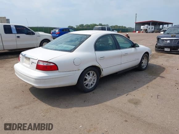 ✅ 2004 Mercury Sable GS • VIN: 1MEFM50U24G602537 • Lot: 42920211. Listed on IAAI with 168,767 mi. Free auction sales archive from the USA and detailed vehicle history report at DreamBid. Image 4.