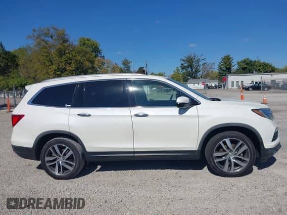 ✅ 2017 Honda Pilot Elite • VIN: 5FNYF6H08HB105293 • Lot: 43451540. Listed on IAAI with 94,862 mi. Free auction sales archive from the USA and detailed vehicle history report at DreamBid. Image 14.