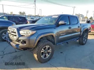 ✅ 2018 Toyota Tacoma TRD Sport • VIN: 3TMAZ5CN7JM066896 • Lot: 95950455. Listed on Copart with 138,800 mi. Free auction sales archive from the USA and detailed vehicle history report at DreamBid. Image 1.