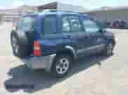 2002 Chevrolet Tracker ZR2 z VIN 2CNBJ734326909319, wystawiony jako IAAI lot #42581447 z przebiegiem 245 396 mil mil oraz . Historia ofert i sprzedaży dostępna na DreamBid. Obrazek 4.