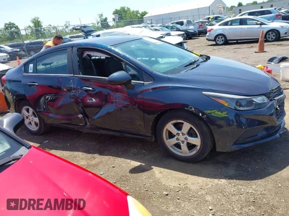 2016 Chevrolet Cruze LT with VIN 1G1BE5SM5G7269564, listed as a IAAI auction lot 42647283 with 149,326 mi miles and . Bid and sale history available at DreamBid. Image 13.