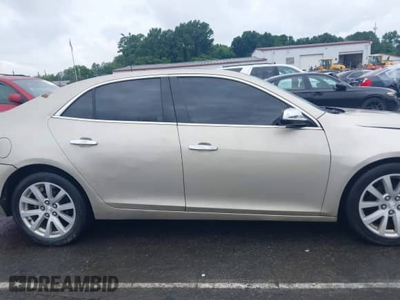 2014 Chevrolet Malibu LS z VIN 1G11A5SL4EF275986, wystawiony jako IAAI lot #42645534 z przebiegiem 173 937 mil mil oraz . Historia ofert i sprzedaży dostępna na DreamBid. Obrazek 13.