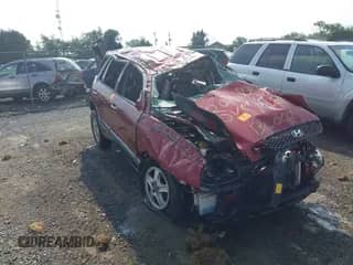 2002 Hyundai Santa Fe GLS z VIN KM8SC73D22U202644, wystawiony jako IAAI lot #42754156 z przebiegiem Nie podano mil oraz . Historia ofert i sprzedaży dostępna na DreamBid. Obrazek 1.