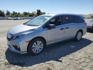 ✅ 2018 Honda Odyssey LX • VIN: 5FNRL6H25JB067865 • Лот: 71128935. Опубликован ранее на Copart с пробегом 43 187 миль. Бесплатный доступ к архиву аукционных продаж из США и подробный отчёт об истории автомобиля на DreamBid. Изображение 1.