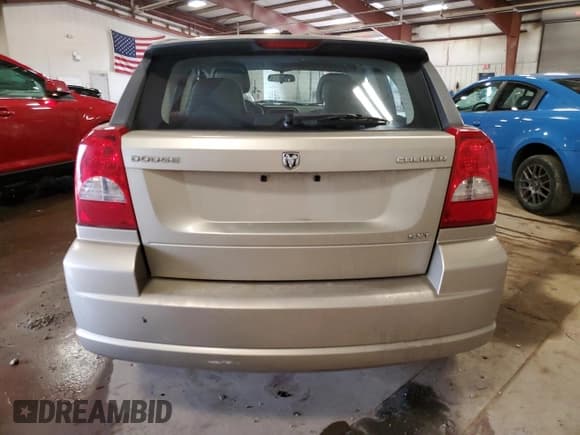 ✅ 2010 Dodge Caliber SXT • VIN: 1B3CB4HA2AD532129 • Лот: 56128244. Опубликован ранее на Copart с пробегом 130 771 миль. Бесплатный доступ к архиву аукционных продаж из США и подробный отчёт об истории автомобиля на DreamBid. Изображение 6.