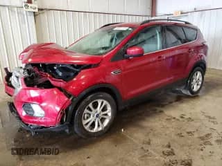 2018 Ford Escape SE z VIN 1FMCU9GD2JUC16551, wystawiony jako Copart lot #85591145 z przebiegiem 40 552 mil mil oraz Szkoda całkowita • Salvage title. Historia ofert i sprzedaży dostępna na DreamBid. Obrazek 1.