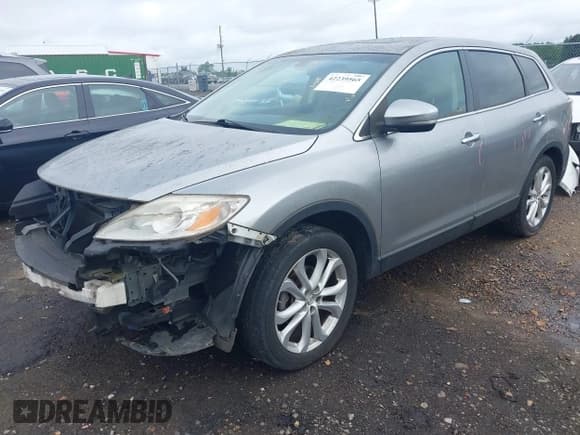 ✅ 2011 Mazda CX-9 Grand Touring • VIN: JM3TB2DA1B0304941 • Лот: 42239565. Опубликован ранее на IAAI с пробегом 157 324 миль. Бесплатный доступ к архиву аукционных продаж из США и подробный отчёт об истории автомобиля на DreamBid. Изображение 2.