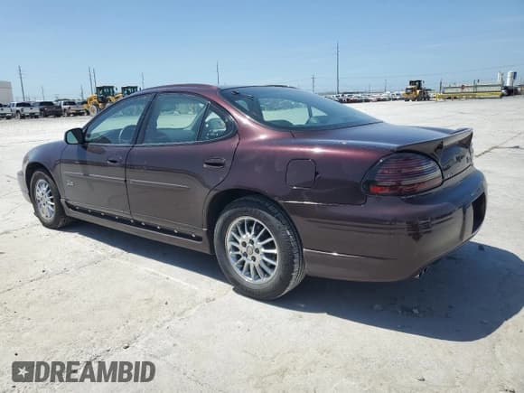 ✅ 2002 Pontiac Grand Prix GTP • VIN: 1G2WR52162F237812 • Лот: 65858535. Опубликован ранее на Copart с пробегом 104 572 миль. Бесплатный доступ к архиву аукционных продаж из США и подробный отчёт об истории автомобиля на DreamBid. Изображение 2.
