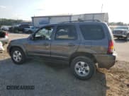 ✅ 2003 Mazda Tribute ES • VIN: 4F2CZ06163KM04237 • Lot: 80303275. Wystawiony na Copart z przebiegiem 164 280 mil. Bezpłatny archiwum sprzedaży aukcyjnych z USA i szczegółowy raport historii pojazdu na DreamBid. Zdjęcie 2.