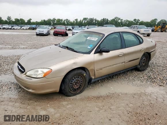 ✅ 2001 Ford Taurus LX • VIN: 1FAFP52U41A179115 • Lot: 58829755. Listed on Copart with 121,395 mi. Free auction sales archive from the USA and detailed vehicle history report at DreamBid. Image 1.