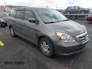 ✅ 2007 Honda Odyssey EX-L • VIN: 5FNRL38617B451975 • Lot: 43687821. Wystawiony na IAAI z przebiegiem 163 306 mil. Bezpłatny archiwum sprzedaży aukcyjnych z USA i szczegółowy raport historii pojazdu na DreamBid. Zdjęcie 1.