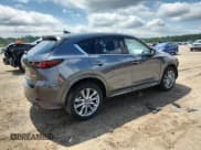 ✅ 2024 Mazda CX-5 S Premium Plus • VIN: JM3KFBEM2R0417784 • Лот: 64378585. Опубликован ранее на Copart с пробегом 20 724 миль. Бесплатный доступ к архиву аукционных продаж из США и подробный отчёт об истории автомобиля на DreamBid. Изображение 3.