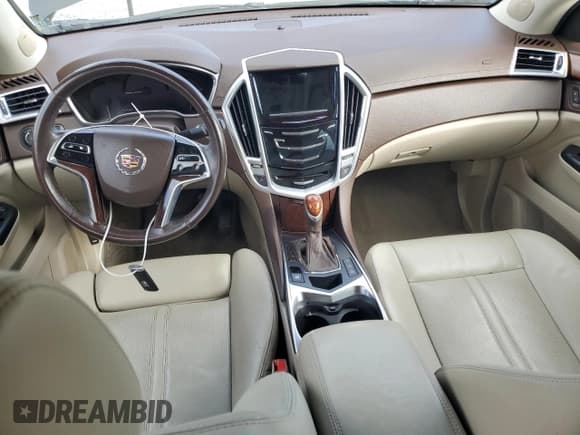✅ 2014 Cadillac SRX Premium Collection • VIN: 3GYFNDE31ES586983 • Lot: 86104535. Wystawiony na Copart z przebiegiem 147 446 mil. Bezpłatny archiwum sprzedaży aukcyjnych z USA i szczegółowy raport historii pojazdu na DreamBid. Zdjęcie 8.