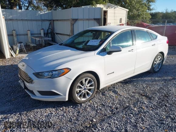 ✅ 2017 Ford Fusion Hybrid SE • VIN: 3FA6P0LU3HR295939 • Lot: 43670019. Listed on IAAI with 149,149 mi. Free auction sales archive from the USA and detailed vehicle history report at DreamBid. Image 2.