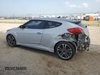 ✅ 2017 Hyundai Veloster Turbo • VIN: KMHTC6AE2HU310054 • Lot: 63442184. Wystawiony na Copart z przebiegiem 103 960 mil. Bezpłatny archiwum sprzedaży aukcyjnych z USA i szczegółowy raport historii pojazdu na DreamBid. Zdjęcie 2.