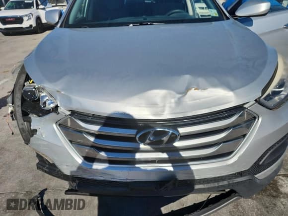 ✅ 2015 Hyundai Santa Fe • VIN: 5XYZT3LB7FG252957 • Lot: 87065335. Listed on Copart with 70,741 mi. Free auction sales archive from the USA and detailed vehicle history report at DreamBid. Image 12.