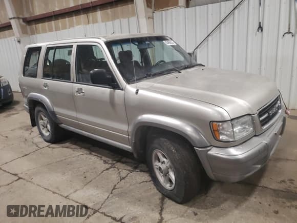 ✅ 1999 Isuzu Trooper S • VIN: JACDJ58X8X7915370 • Lot: 83466824. Listed on Copart with 143,588 mi. Free auction sales archive from the USA and detailed vehicle history report at DreamBid. Image 4.